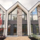 Fronts Of Modern Houses Lined Up To Each Other